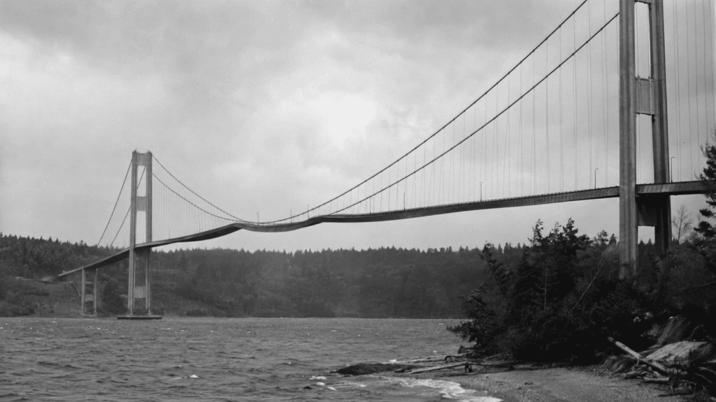 Tacoma Narrows Bridge deck twisting in strong wind before its 1940 collapse.
